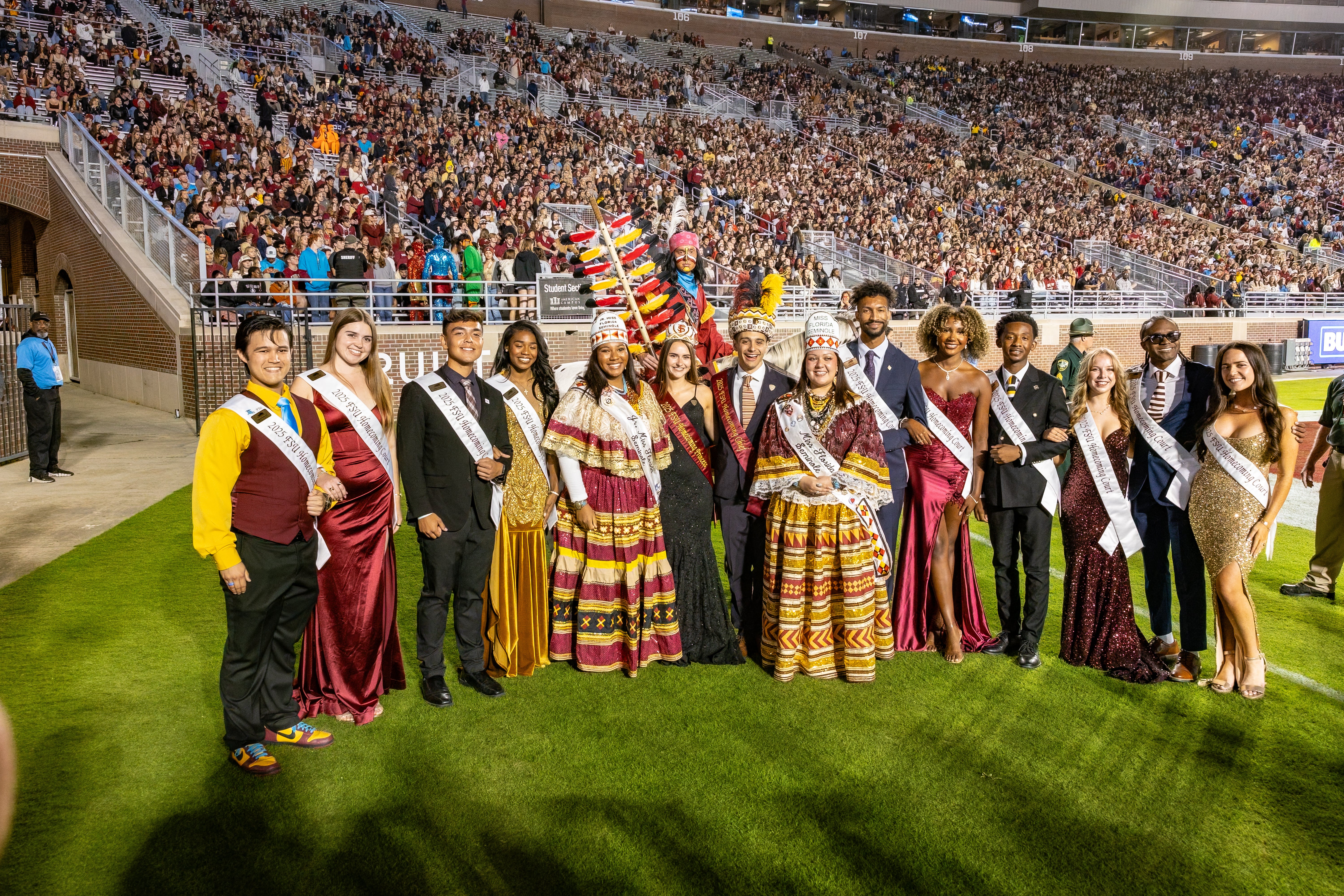 homecoming court standing in doak campbell stadium